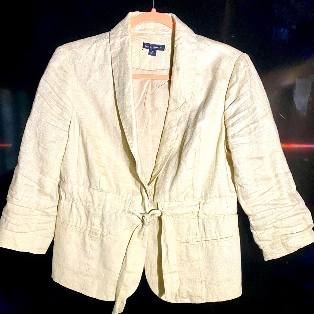 Sporty/business lien blazer with cinched waste feature.